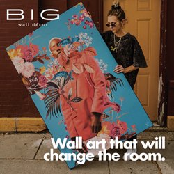 Lifestyle image holding a large floral wall art piece